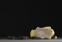 China - Yellow porcelain duck on wooden base, Qing period.