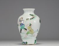 China - Polychrome porcelain vase decorated with characters.