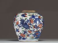China - A polychrome porcelain vase decorated with flowers, trees and birds, 17th century.