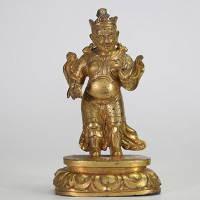 TIBET, XIXe SIÈCLE Roi gardien (Dharmapala) Bronze doré.