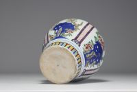 China - A 19th century polychrome porcelain vase with floral decoration.
