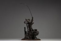 Japan - ‘The fisherman’ Bronze sculpture with brown patina, monogrammed on the back, late 19th century.