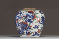China - A polychrome porcelain vase decorated with flowers, trees and birds, 17th century.