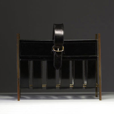 Jacques ADNET (1900-1984) Brass and leather magazine rack, circa 1940.