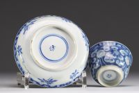 China - Bowl and plate in white-blue porcelain with floral decoration, mark under the piece, 17th century.