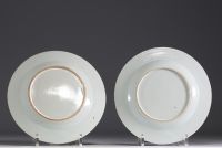 Set of eight plates in pink family polychrome porcelain, 18th century.