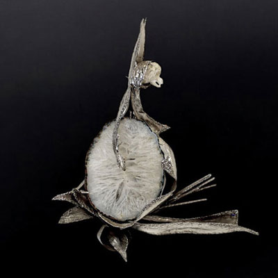 Marc D' HAENENS (20th century) Large Brutalist wall light in quartz, rock crystal and metal, circa 1970.