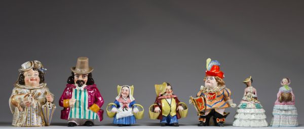 Ensemble de sept pots à tabac figuratifs en porcelaine polychrome, Paris, XIX-XXème
