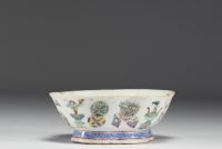 China - Famille rose polychrome porcelain bowl decorated with furniture, circa 1920.