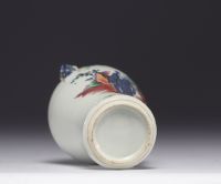 Vase en porcelaine de chine à décor de personnages 