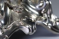 Imposing Menorah in solid silver, chased and hammered in the Baroque style, hallmarked 925 by Israeli silversmiths (Hazorfim),