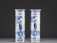 China - Pair of blue-white porcelain vases decorated with ladies and bats, Kanjxi mark, 19th century.