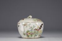 China - Polychrome porcelain teapot with floral decoration and cranes, mark under the piece.