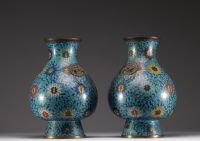 China - Pair of bronze vases in cloisonné enamel with lotus and foliage decoration, handles with taotie heads, Ming period.