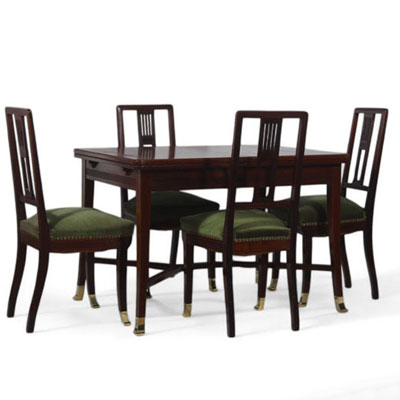 Set of four Art Nouveau mahogany chairs and table, Austria, circa 1910.