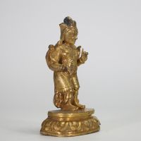 TIBET, XIXe SIÈCLE Roi gardien (Dharmapala) Bronze doré.