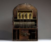 Four-piece organ clock, painted dial, Roman numerals, early 19th century.