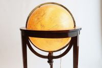 GIRARD & BARRERE, Paris - Luminous glass globe, tripod mahogany base, zodiac signs on wooden belt, circa 1930