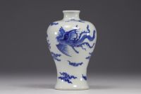 China - Meiping vase in white and blue porcelain with dragon and phoenix design, mark under the piece.