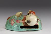 China - Figurative wall flower pot in pink family polychrome porcelain.