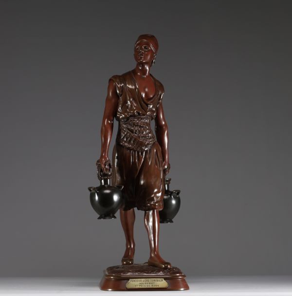 Jean Didier DEBUT (1824-1893) ‘Le porteur d'eau tunisien’ Bronze with brown patina, signed.