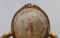 Important set of carved and gilded wood salon furniture, fine Aubusson tapestry including a sofa and a suite of four bergère armchairs, 19th century.