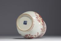 China - Iron-red porcelain vase decorated with fruit and bats, blue mark.