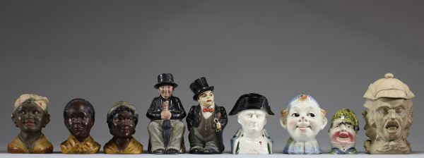 Ensemble de neufs tirelires en terre cuite, faïence et porcelaine.