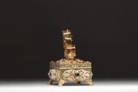 Silver and vermeil jewellery box, lid surmounted by a galleon, inlaid with cabochon semi-precious stones and pearls around the rim, Austria, 18th-19th century.