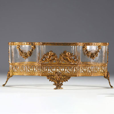 Gilt bronze and chased planter with Putti decoration, glass bowl, 19th century.
