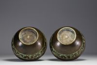 China - Pair of bronze vases decorated with Fô dogs, debossed mark under the pieces.