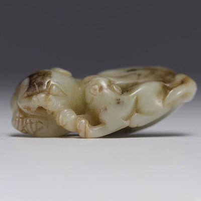China - Carved jade reclining lions, 18th century.