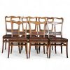 Victor Horta (1861-1947) Suite exceptionnelle de six chaises Art nouveau – Commande de Valère Carpentier (1899)  Cet ensemble rare de six chaises en chêne est une remarquable illustration du style Art nouveau de Victor Horta, l’un des pionniers de ce mouvement en Belgique. Ces pièces ont été spécialement conçues en 1899 pour Valère Carpentier, un riche industriel et amateur d’art, à l’occasion de