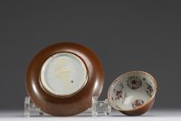 China - Porcelain bowl and plate with internal floral and capuchin decoration, 18th century.