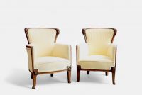 Louis MAJORELLE (1859-1926) Pair of Art Nouveau armchairs in moulded mahogany with fruit and flower motifs.