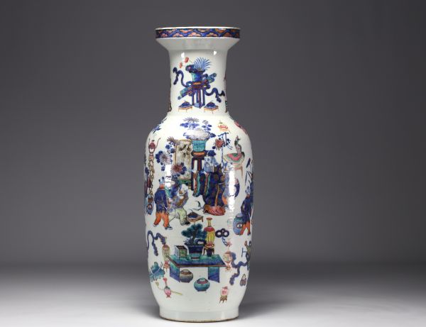 China - Large polychrome porcelain vase richly decorated with figures and furniture, 19th century.