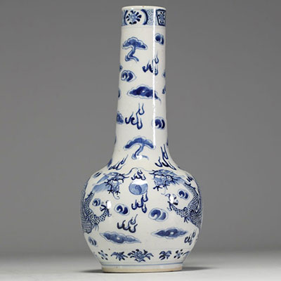 China - White-blue porcelain vase decorated with dragons, blue mark under the piece.