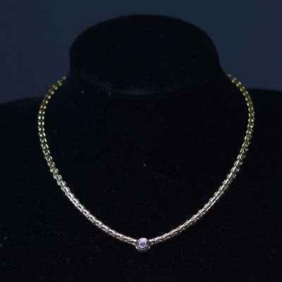 Necklace in 18k gold and brilliant-cut diamonds weighing 40g.