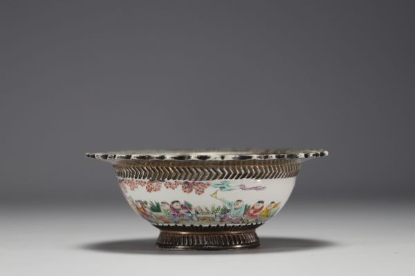 China - Famille rose porcelain bowl decorated with children, recessed mark, Republic period.