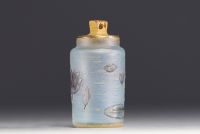 DAUM Nancy - Small perfume bottle in acid-etched frosted glass, enamelled decoration of water lilies, signed.