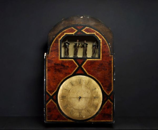 Four-piece organ clock, painted dial, Roman numerals, early 19th century.