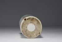 China - A polychrome porcelain brush-holder decorated with characters and a poem, circa 1900.