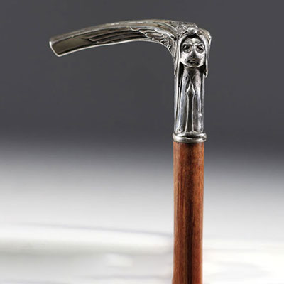 Cravache with Art Nouveau design of a woman's face in sterling silver, hallmark 800, Switzerland.