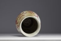 China - Iron-red porcelain vase decorated with fruit and bats, blue mark.
