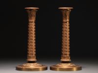 Paire de bougeoirs Empire en bronze, début XIXème.