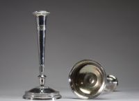Paire de bougeoirs en argent massif d'époque Empire. 