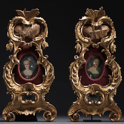 A pair of carved and gilt wood frames, one containing a miniature painting of a lady's portrait, 19th century.