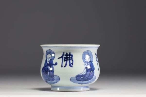 China - White and blue porcelain brush with sage decoration.