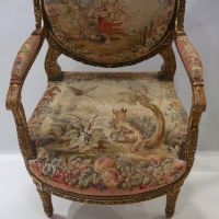 Important set of carved and gilded wood salon furniture, fine Aubusson tapestry including a sofa and a suite of four bergère armchairs, 19th century.