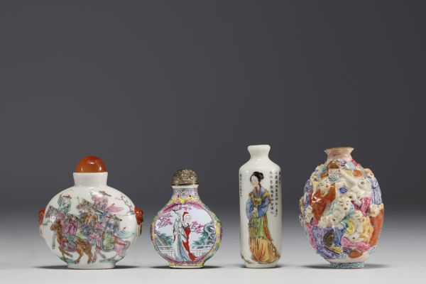 China - Set of four snuffboxes, three in polychrome porcelain and one in cloisonné enamel.